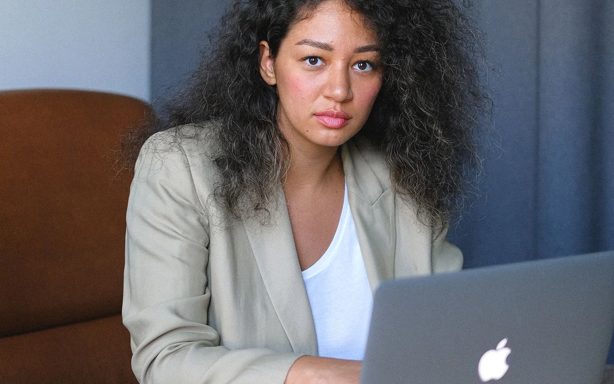 Entrepreneur working on her laptop at a desk